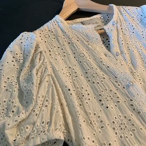 Anthropologie label; cream eyelet blouse